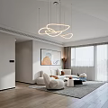 Modern Living Room With Circular Chandelier Cozy Sofa And Artwork