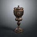 Antique Carved Bronze Sculpture With Intricate Lid And Decorative Base
