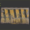 Worn Concrete Traffic Barrier With Yellow And Black Stripes And Textured Surface