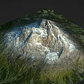 Rocky Snow Covered Mountain Peak Terrain With Green Vegetation At Base