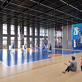 Spacious Basketball Court With Blue Orange Flooring Large Windows Wall Posters And Spectators