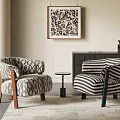 Two Modern Armchairs With Geometric And Striped Patterns Small Round Table Cabinet Wall Art And Rug