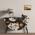 Decorative Black Semicircular Locker with White Gold Patterns Vase Flowers and Teapot Near Wall Painting