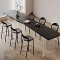 Modern Black Bar Counter With Clear Acrylic Legs And Black Bar Stools On Wooden Floor