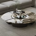 Round Marble Coffee Table In Modern Living Room With Tray Vase And Green Plants