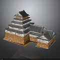 Traditional Japanese Castle With Multi Tiered Tower Gray Tiled Roof And White Orange Stone Walls
