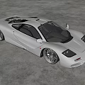 Gray Sports Car With Sleek Design And Black Wheels In Spacious Indoor Concrete Background