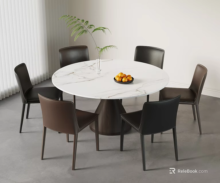Stylish Round White Marble Dining Table With Black Brown Chairs Fruit Bowl And Green Plant 3d model 