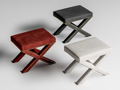 Three Colored Upholstered Stools In Red Black White With Cross Legged Design And Rivet Details 3d model