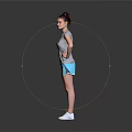 Woman Wearing Gray T-shirt Light Blue Shorts With Bun Hairstyle Hands On Hips