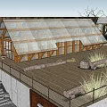 Modern Guesthouse Building With Glass Roof Wooden Structure Deck Stones And Natural Grass