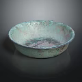 Round Copper Bowl With Green Patina And Textured Surface On Black Background With Reflection