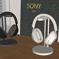 Sony XM5 Headphones Black And White On Stands On Wooden Table In Modern Indoor Setting