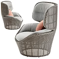 Modern Wicker Leisure Chair with Light Gray Cushion and Pink Pillow