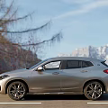 Stylish Silver BMW SUV Exterior Design On Road With Grass Side