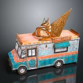 Vintage Ice Cream Truck With Orange Blue Exterior And Giant Ice Cream Cone Top