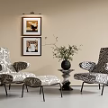 Stylish Zebra Print Accent Chairs With Ottoman Potted Plant And Wall Art