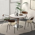 Modern Round Dining Table Set With Four Wooden Chairs Metal Base And Plant