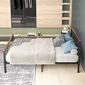 Double Bed with Wooden Metal Frame Gray Quilt Blue and Checkered Pillows Wooden Cabinet Mirror