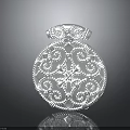 Silver Decorative Circular Clothing Accessory with Intricate Floral Patterns and Ornate Design