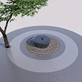 Garden Ornament With Central Water Feature And Circular Paving Around Tree