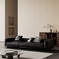 Minimalist Living Room With Black Leather Multi Seater Sofa Decorative Pillows Wooden Bookshelf Beige Wall