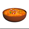 Orange Vegetable Stew in Brown Bowl with Red White Diced Veggies and Green Herbs