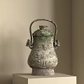 Ancient Style Bronze Ornamental Piece With Carved Patterns Handle And Lid On Display Stand