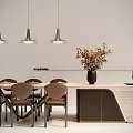 Modern Dining Table Set With Chairs Pendant Lights And Flower Vase On Countertop