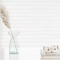 Transparent Glass Vase With Dried Pampas Grass On White Tabletop And White Blinds Background