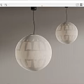 Decorative Spherical Pendant Lights With Intricate Geometric Patterns Hanging On Gray Wall