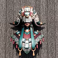 Intricate Sculpture Carving Of Traditional Figure With Ornate Headpiece And Tassel Decorations