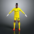 Man Standing in Yellow Goalkeeper Uniform With Spartech Number 24 White Gloves and Orange Cleats