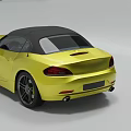 Yellow Convertible Sports Car With Black Top Sleek Front And Black Wheels
