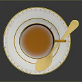 White Teacup With Gold Rim And Decorations On Matching Saucer With Gold Spoon