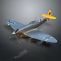 German Fighter Aircraft Model With Silver Body Yellow Tail And Swastika Symbols On Wings