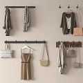 Metal And Wooden Wall Hooks With Coats Dresses Bags And Scarves On Bedroom Wall