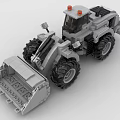Gray Building Blocks Loader With Large Tires Front Bucket And Orange Lights