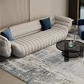 Beige Sofa With Dark Blue Cushions And Black Coffee Table In Modern Living Room