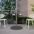 Garden Landscape Design With Terrace Outdoor Umbrella White Chairs And Green Plants