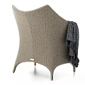 Beige Woven Leisure Chair With Light Blue Cushions Dark Blanket And Metal Legs