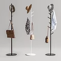 Modern Coat Racks With Black And White Bases Hanging Hats Bags And Clothes