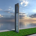 Tall Vertical Metal Signboard With Text Logos Green Grass Calm Water And Blue Sky View