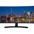 Curved Computer Monitor Showing City Skyline Night View With Water Reflection And Sleek Design