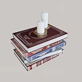Stack of Books with Red Cover and Gold Candle Holder Featuring White Candles