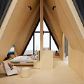 Bright Hotel Room With Triangular Wooden Roof Large Windows Comfortable Bed And Armchair