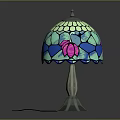 Stained Glass Table Lamp With Pink And Blue Floral Patterns Silver Base And Lace Trim