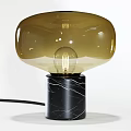 Golden Glass Table Lamp With Black Marble Base And Vintage Bulb Design