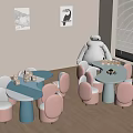 Cute Pink And Blue Children's Chairs With Small Tables In Indoor Kids Room