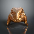 Shiny Golden Rabbit Head Sculpture With Metallic Finish On Dark Background
